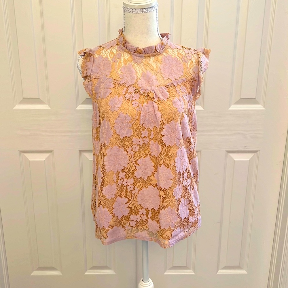 Feminine and fun! This lace brocade baby capped ruffled sleeves is so pretty.